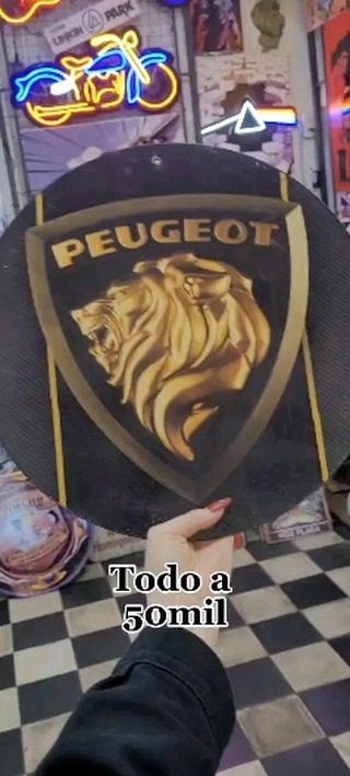 Cartel Peugeot león