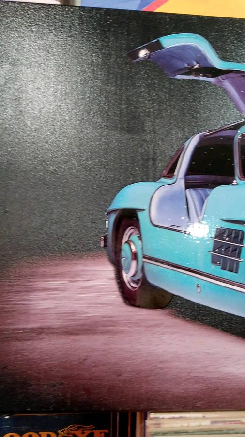 Cuadro Auto clásico celeste con puertas de ala de gaviota