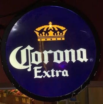 Neón Corona Extra (redondo luminoso, fondo azul) – foto 4