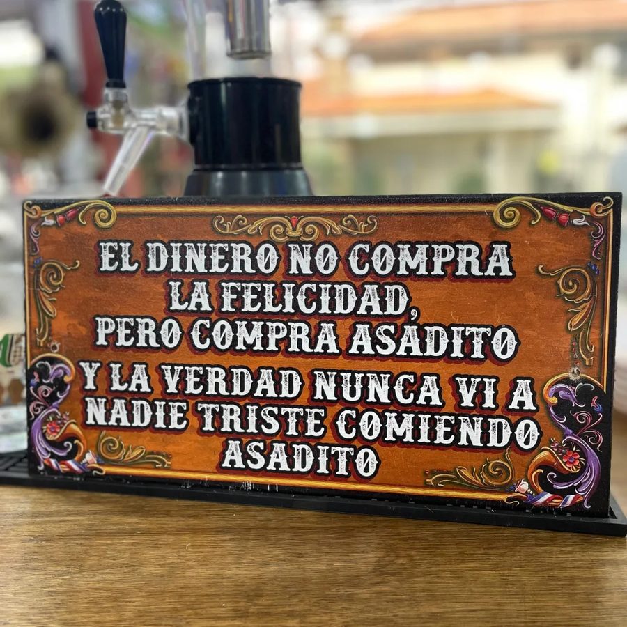 Cuadro El dinero no compra la felicidad pero compra asadito