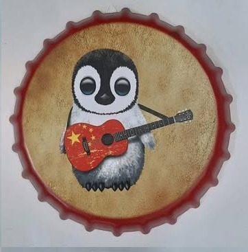 Tapa decorativa Pingüino con guitarra